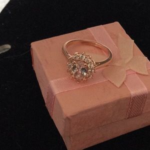 Rose gold ring with white sapphires size 5